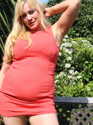 British housewife getting sun tanned in the garden