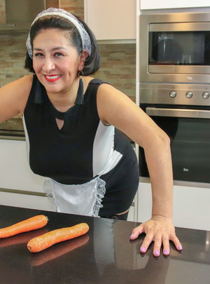 Mature.nl This Spanish mature housewmaid plays with the carrots from her work mature xxx sex photo