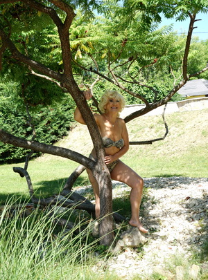 Mature.nl Horny blonde mature woman getting naughty in her garden mature xxx sex photo