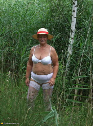 Mature.nl Naughty mama playing with herself in the grass mature xxx sex photo