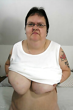 Big Mama Playing With Her Toy And Tits
